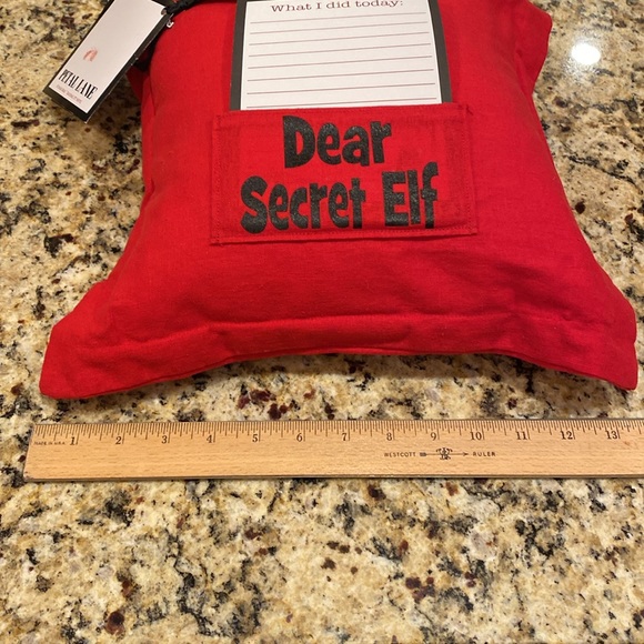 Petal Lane “Dear Secret Elf” pillow. 10” pillow with removable red slip cover. - Picture 9 of 11